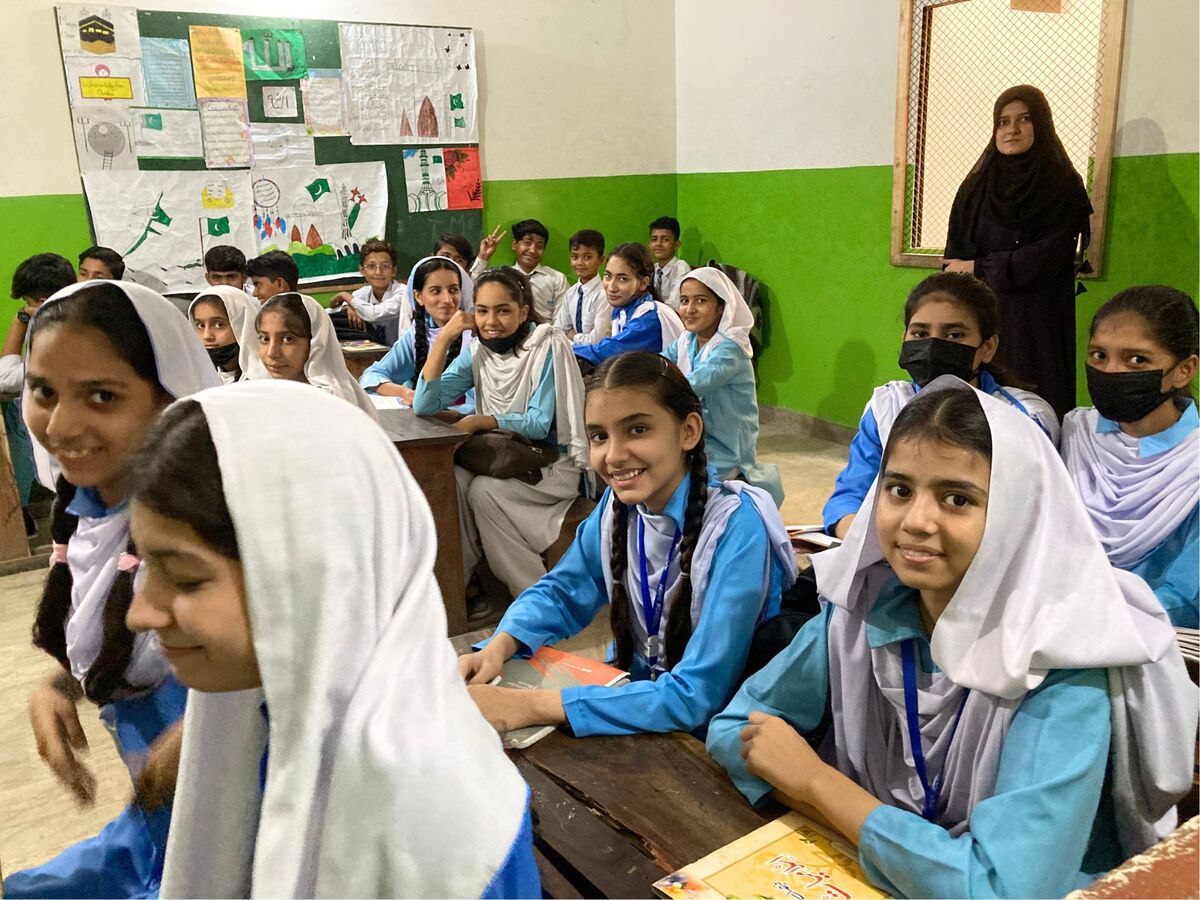Students at desks in a Pakistani classroom